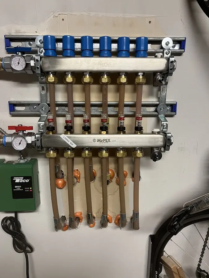 Plumber performing Gas Line Installation at a residential property in Bellaire